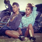 Young couple relaxing on the beach